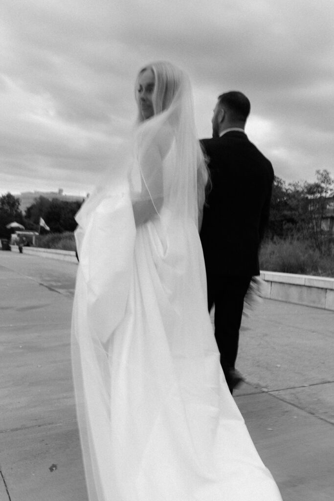 Bride and groom editorial portraits outside the Field Museum in Chicago.