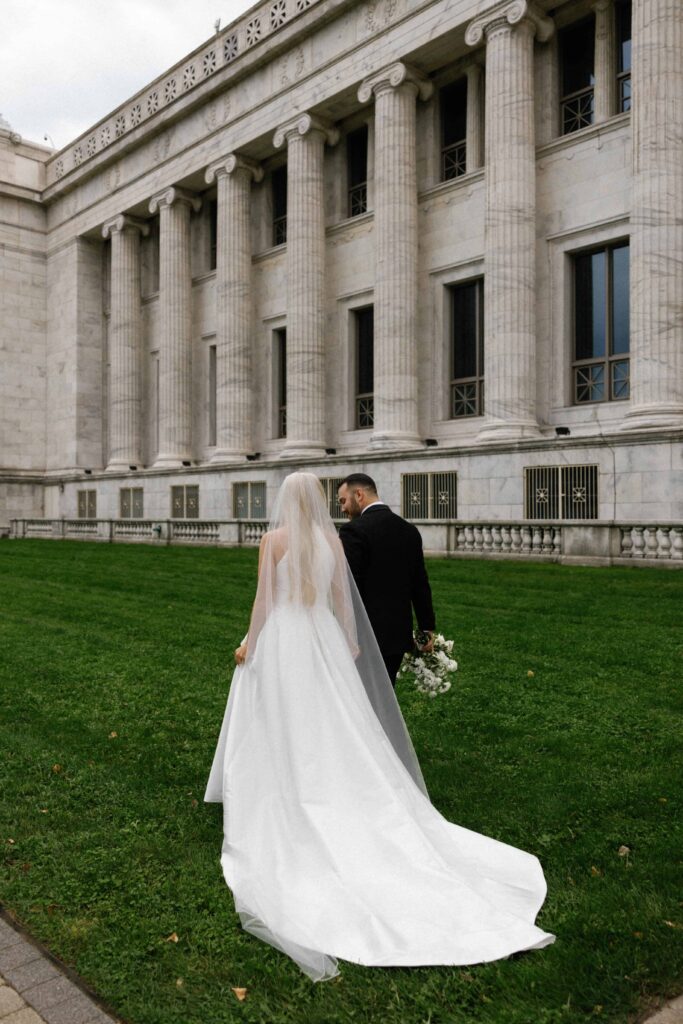 Bride and groom editorial portraits outside the Field Museum in Chicago.