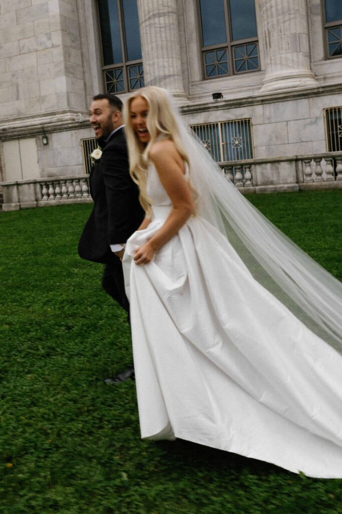 Bride and groom editorial portraits outside the Field Museum in Chicago.