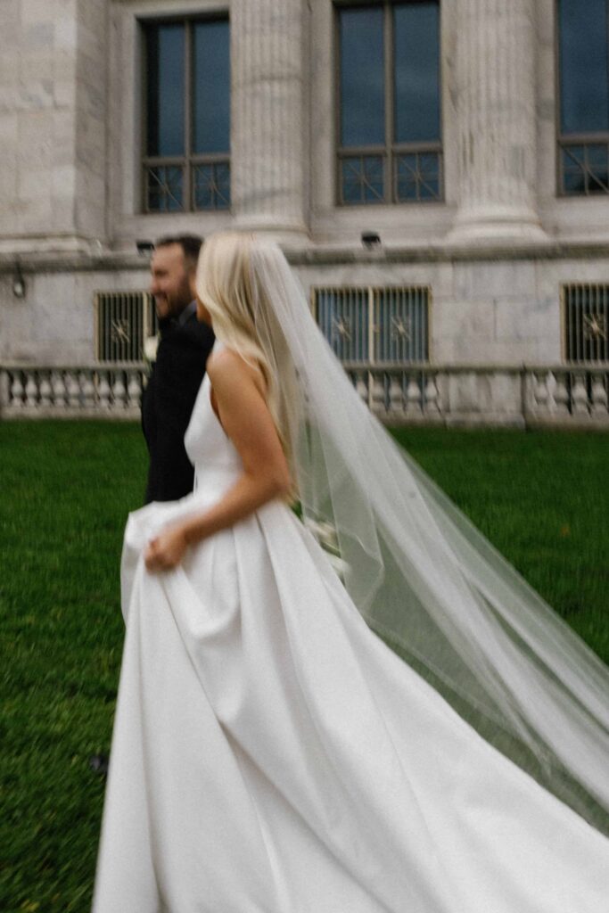 Bride and groom editorial portraits outside the Field Museum in Chicago.