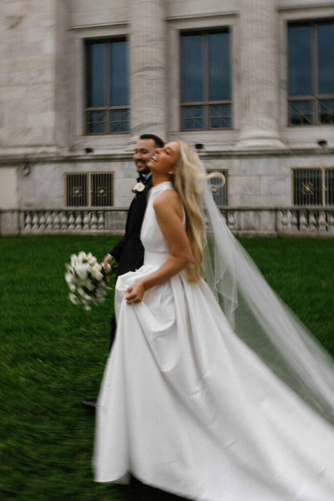 Bride and groom editorial portraits outside the Field Museum in Chicago.