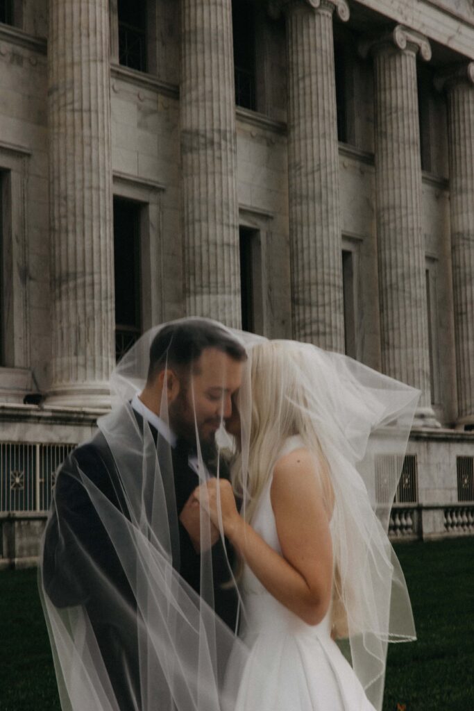 Bride and groom editorial portraits outside the Field Museum in Chicago.