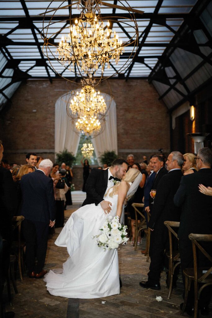 A bride and groom at their wedding ceremony in Chicago at the Bridgeport Art Center.