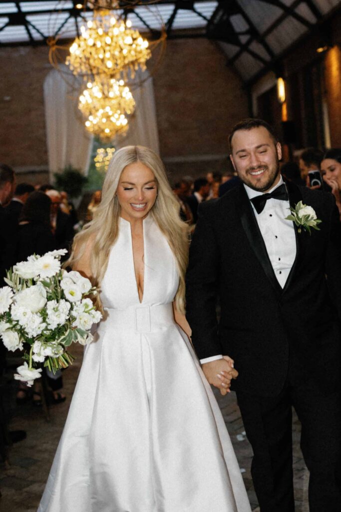 A bride and groom at their wedding ceremony in Chicago at the Bridgeport Art Center.