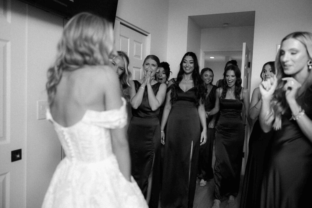 Bridal party first look with bride on her wedding day in Chicago.