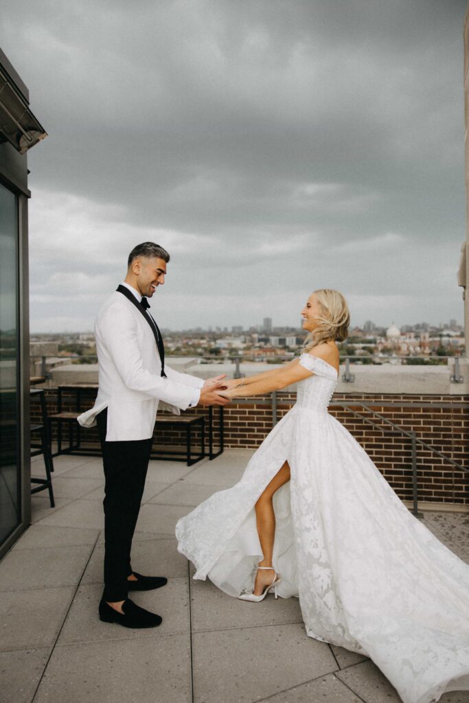 Bride and groom first look photos on a rooftop in Chicago.