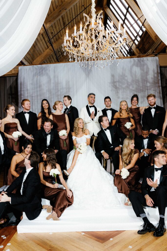 Vogue inspired editorial group photo during a luxury Chicago wedding at Bridgeport Art Center.