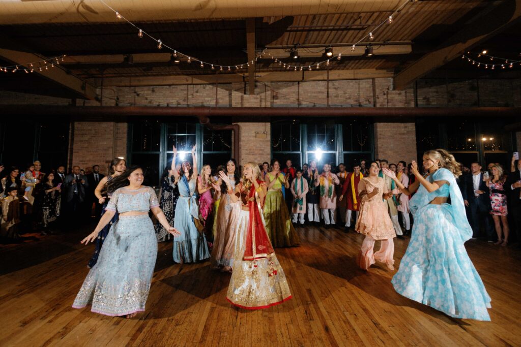 Wedding families dancing during the reception at the Bridgeport Art Center.