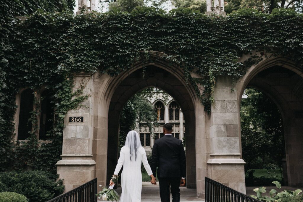 Bride and groom holding hands at Fourth Presbyterian Church in Chicago