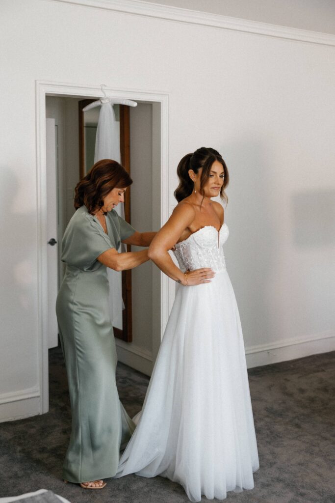 Bride getting ready at her Bridgeport Art Center wedding.