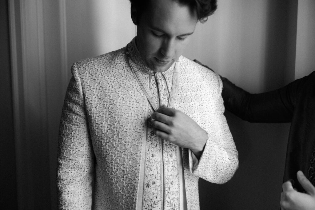 Black and white groom portrait before his Chicago Cultural Center wedding.