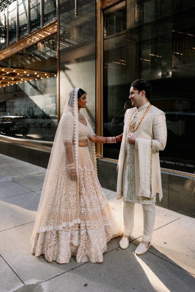 Bride and groom downtown Chicago portraits outside Chicago Cultural Center.