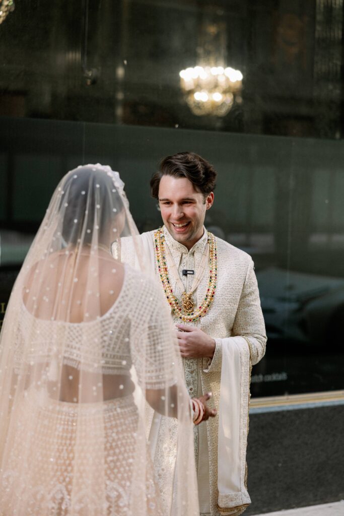 Bride and groom downtown Chicago portraits outside Chicago Cultural Center.