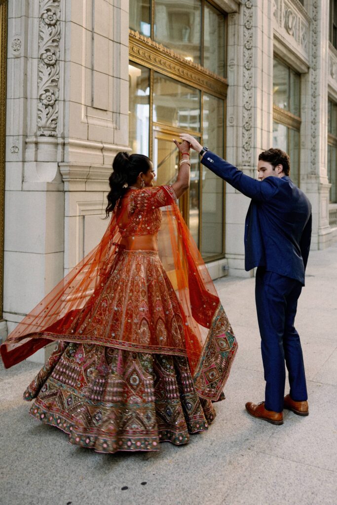 Bride and groom dancing photos at their Chicago Cultural Center wedding.