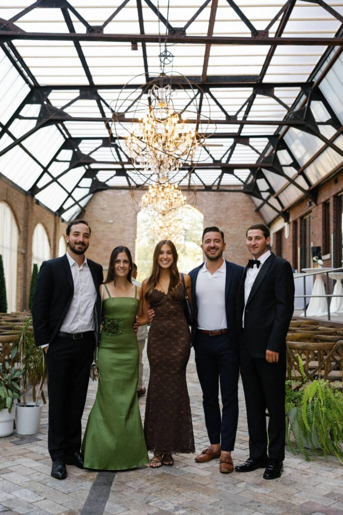 Guests in the Sculpture Garden at the Bridgeport Art Center wedding venue.