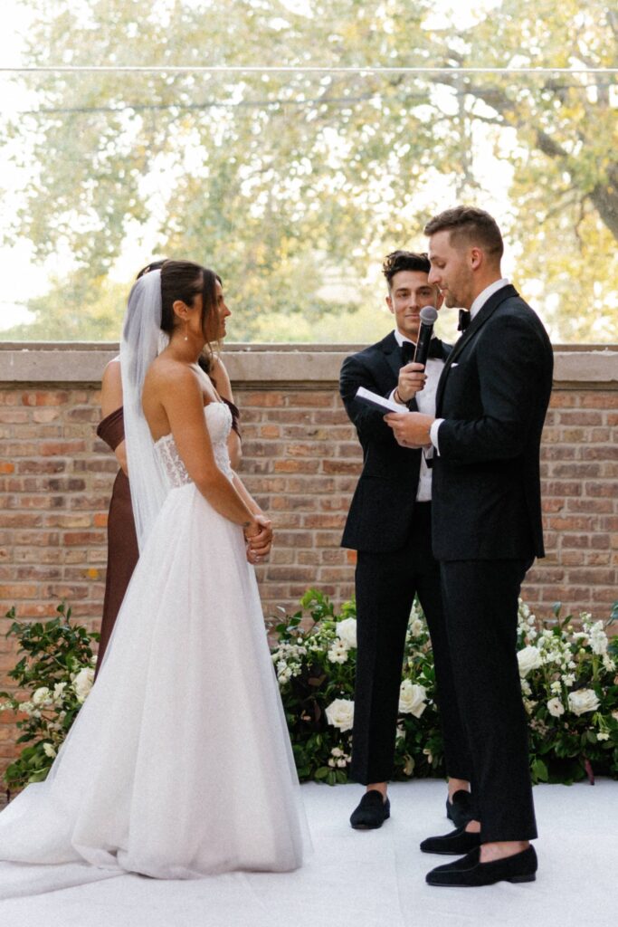 The groom shares her vows at Bridgeport Art Center Chicago wedding.