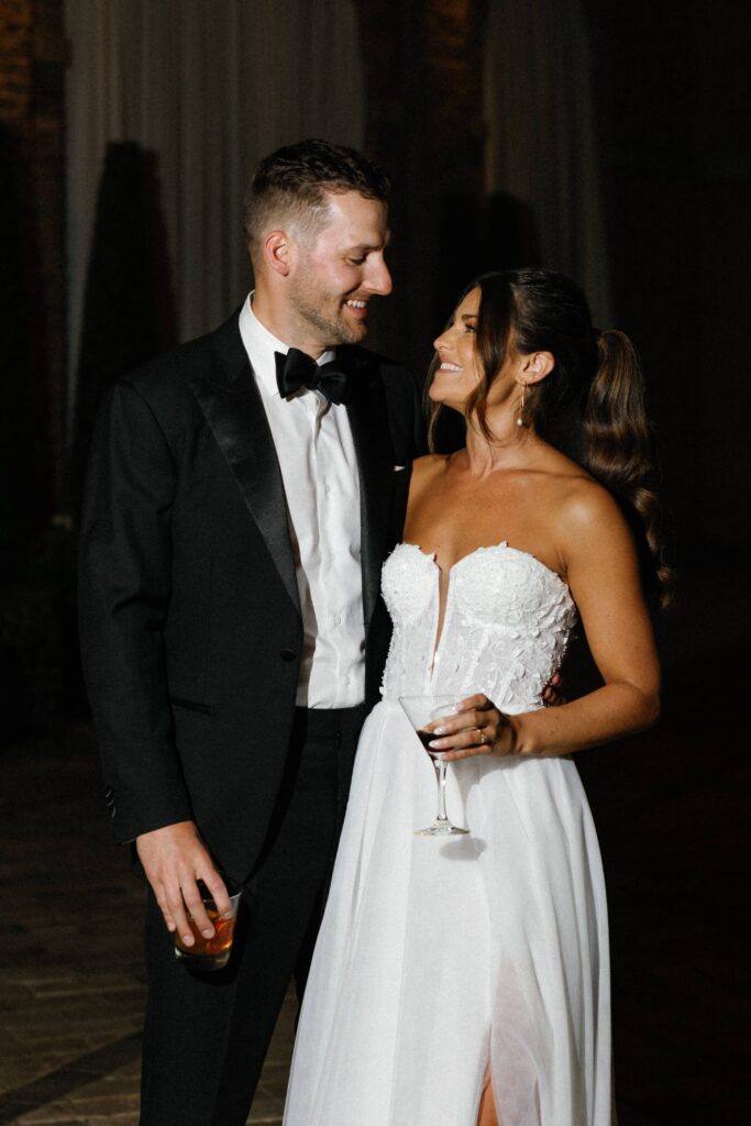 Wedding reception editorial portraits with the bride and groom in Bridgeport Art Center.