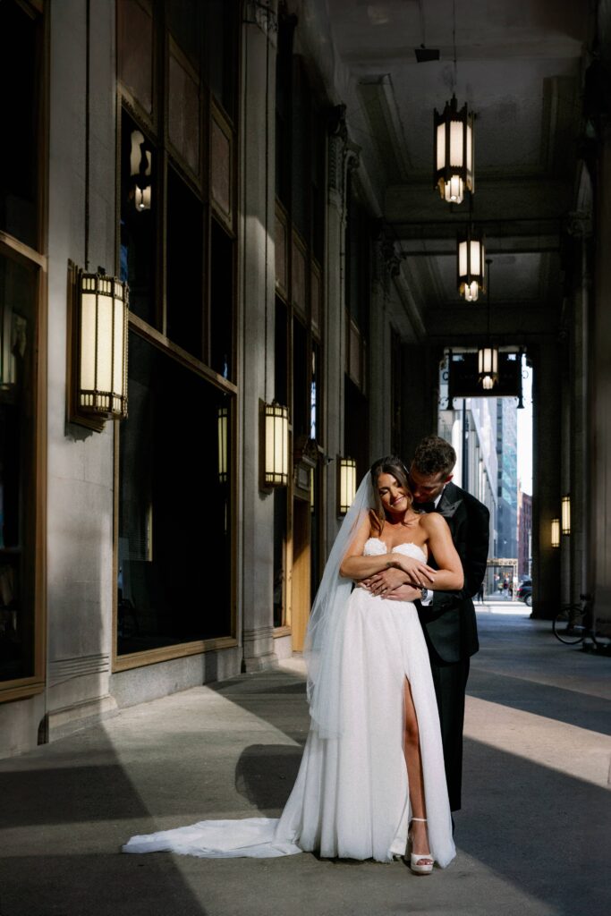 Stunning modern editorial portraits with the bride and groom in Chicago at the Lyric Opera House.