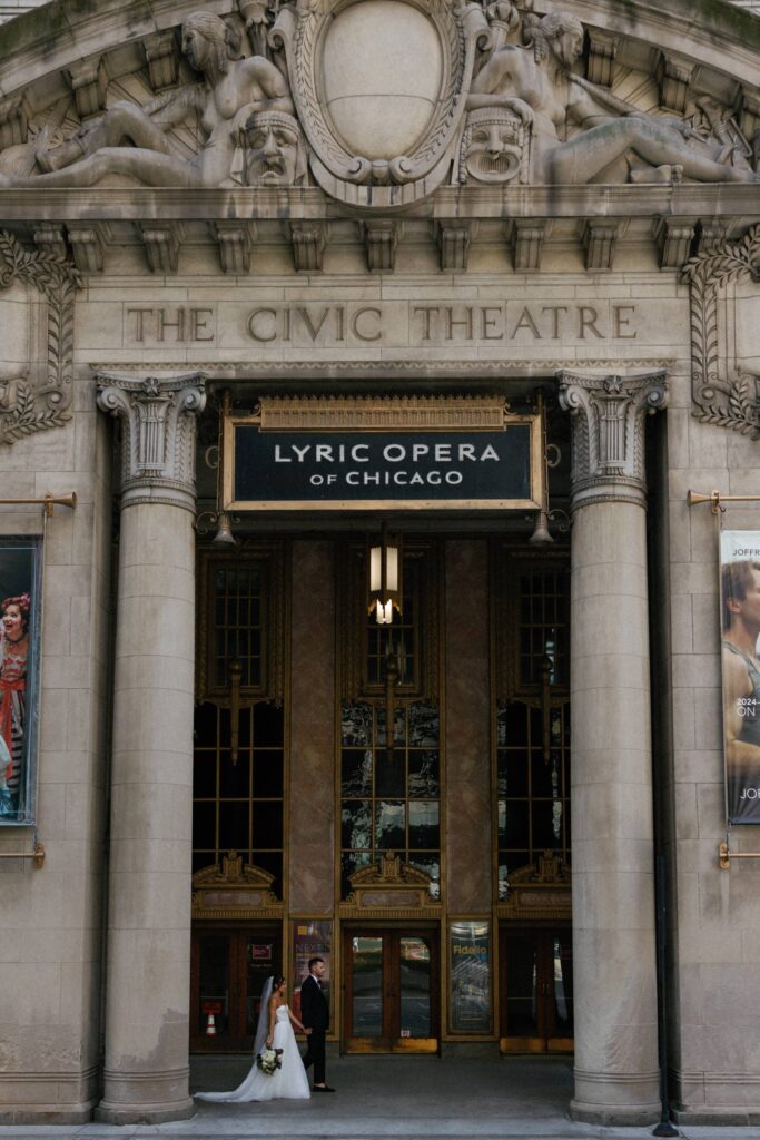 Stunning modern editorial portraits with the bride and groom in Chicago at the Lyric Opera House.