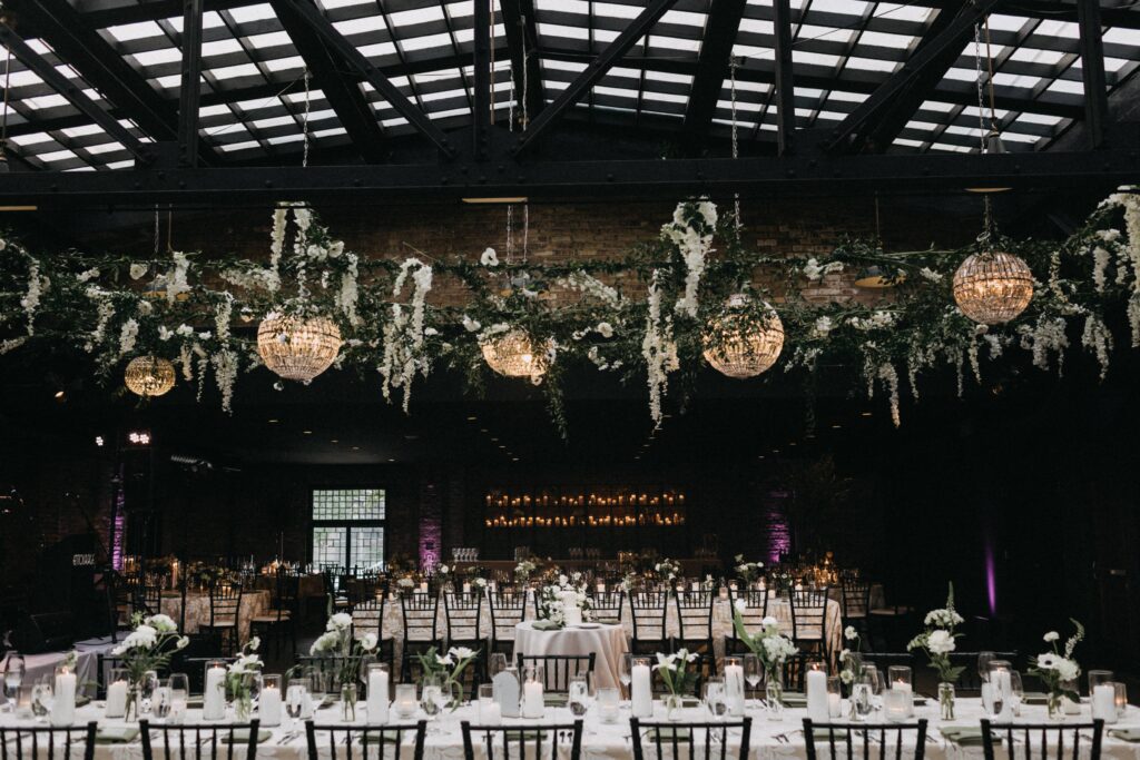 Revel Space wedding reception floral and table decor.