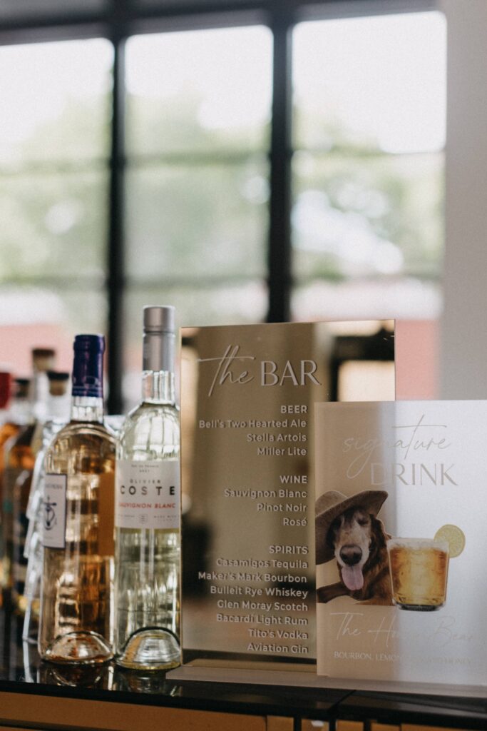 Wedding reception details with a custom drink inspired by the couple's dog Honey.