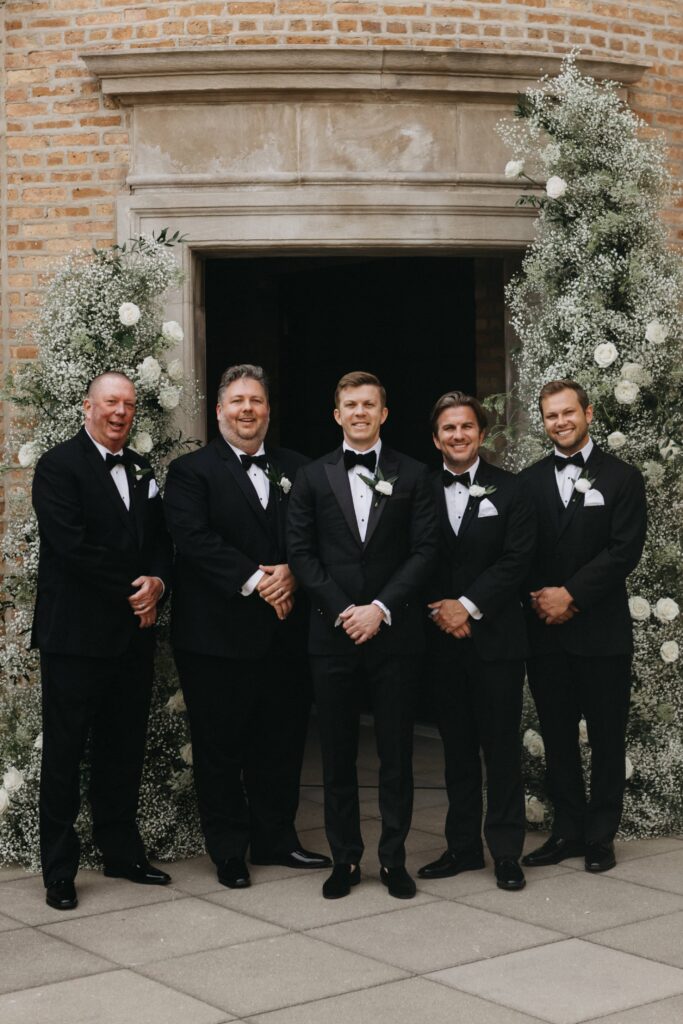 Groom and his groomsmen group photo at Chicago's Revel Space.