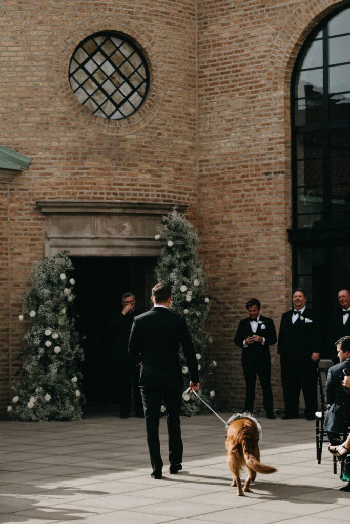 The bride and groom's dog walked down the aisle at Revel Space in Chicago.