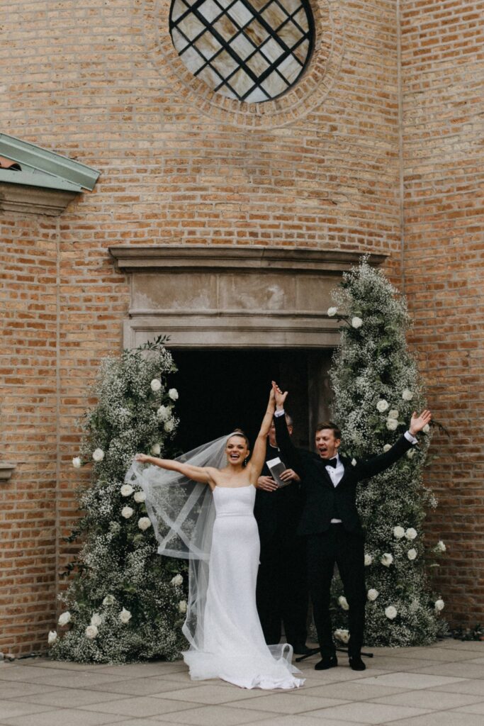 Bride and groom celebrate with their guests during the Revel Space ceremony.