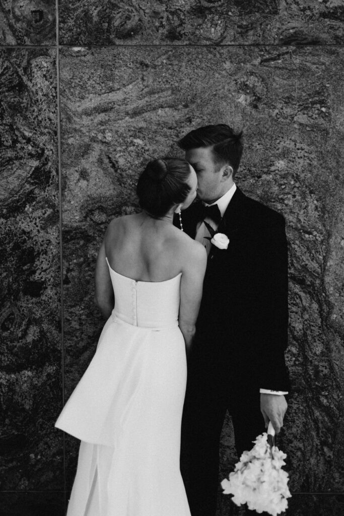 Black and white wedding portraits at Adler Planetarium.