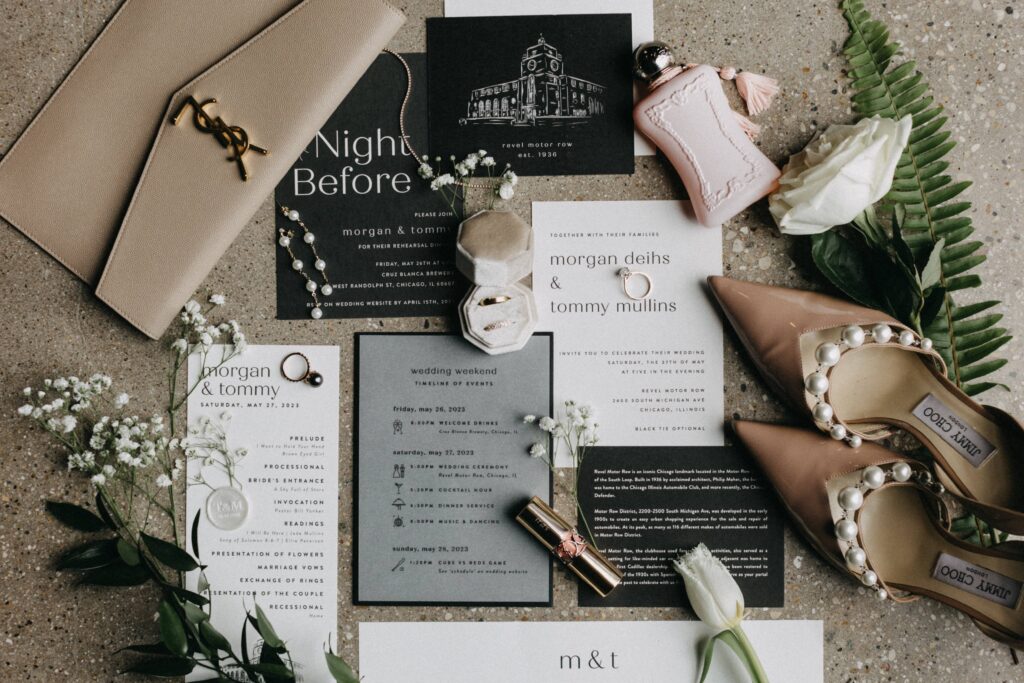 Flatlay and wedding day details, invitations, and florals at Revel Space in Chicago.