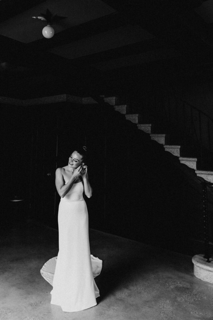 Black and white bridal portraits as she gets ready