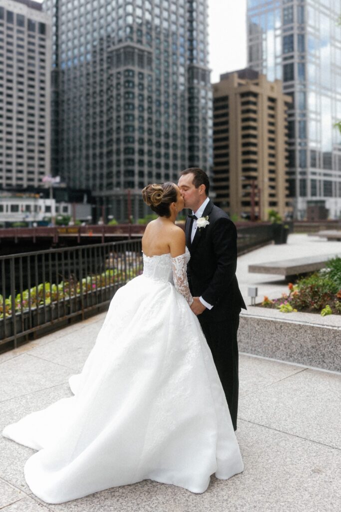 Bride and groom kiss after their first look