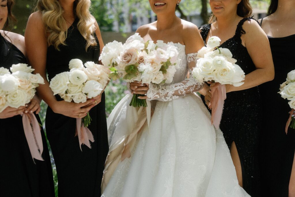 Bride and bridesmaids close up holding bouquets in Chicago