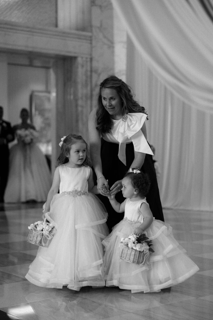 Wedding guests and flower girls at The Old Post Office