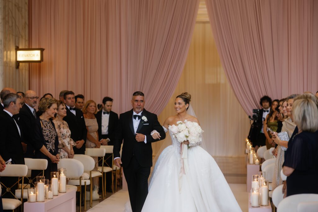Bride walking down the aisle at The Old Post Office