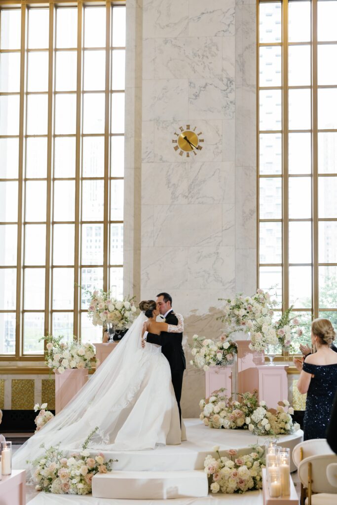 First kiss at The Old Post Office Chicago wedding ceremony
