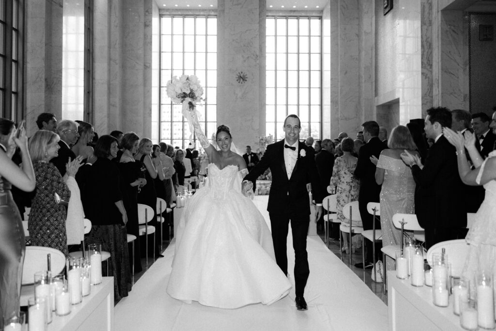 Bride and groom walking up the aisle after ceremony in Chicago