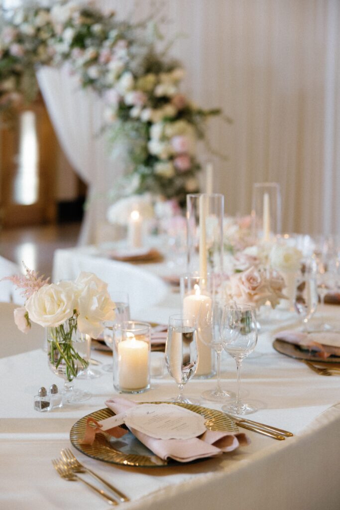 Reception hall with dramatic lighting and chic wedding décor in Chicago