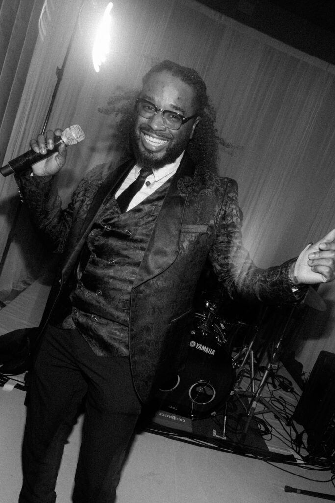 Singer dancing at wedding reception