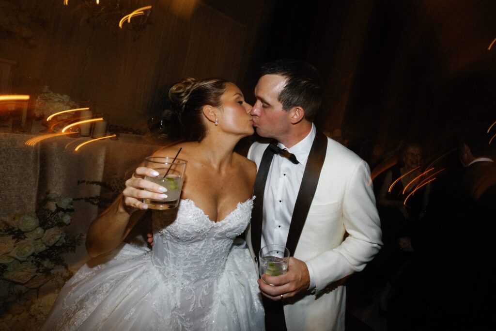 Couple kissing during dancing at The Old Post Office