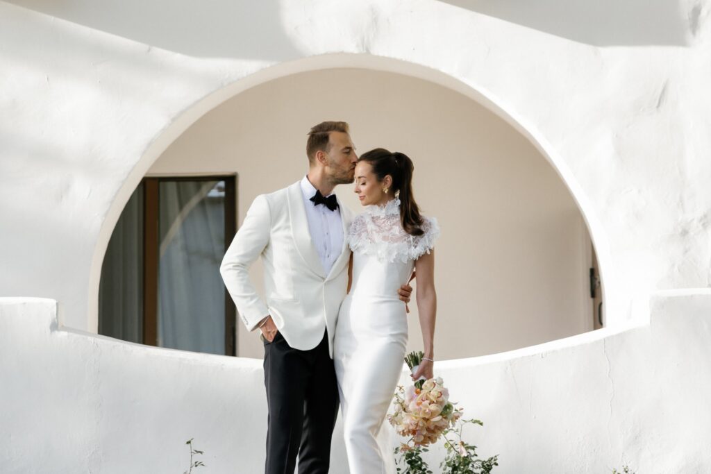 Wedding portraits in front of Ojai Valley Inn buildings