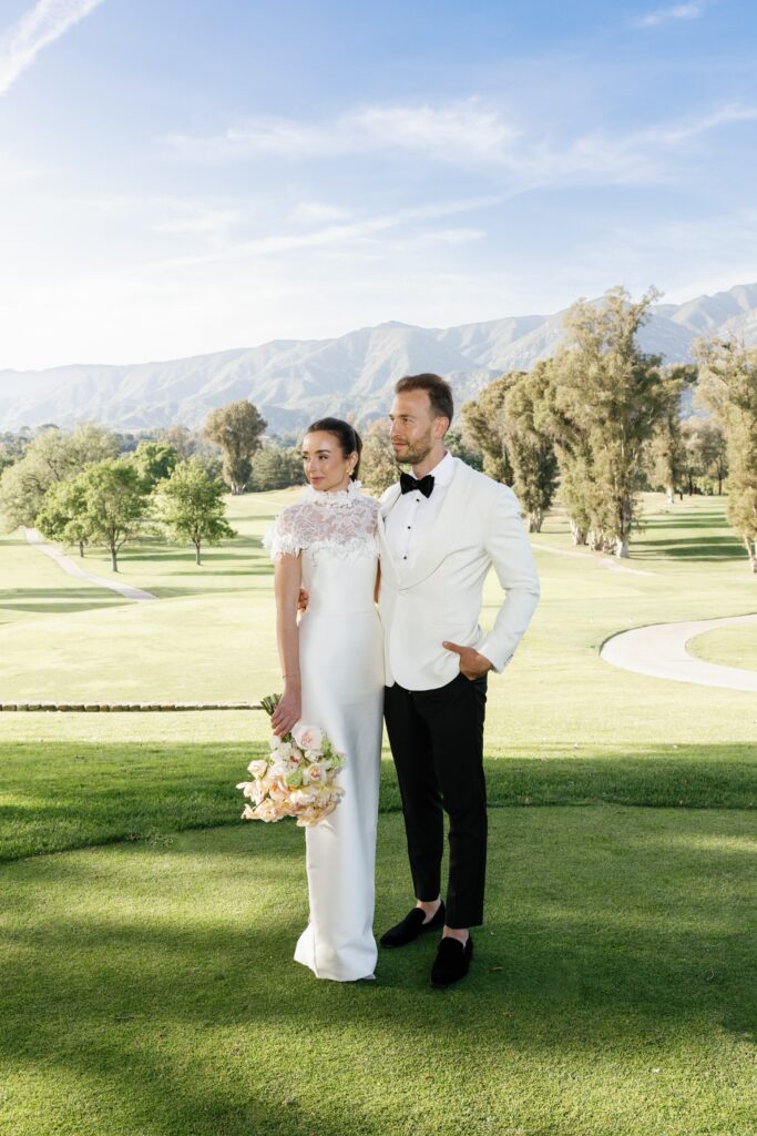 Bride and groom editorial photo in front of the Ojai Valley Inn mountain view